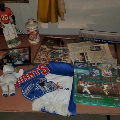 #3706 â€¢ Sport Memorabilia including news letters , figurines, photos patches and more !