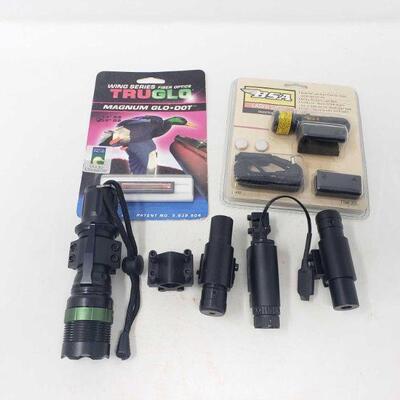 2122	

Four Laser Sights, One Tactical Light with Mount, and One TruGlo Magnum Glo-Dot
Four Laser Sights, One Tactical Light with Mount,...