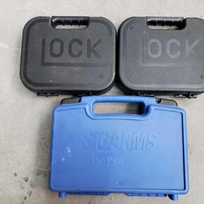 3118	

2 Glock Handgun Cases, 1 Sigarms Hand Gun Case
2 Glock Handgun Cases, 1 Sigarms Hand Gun Case