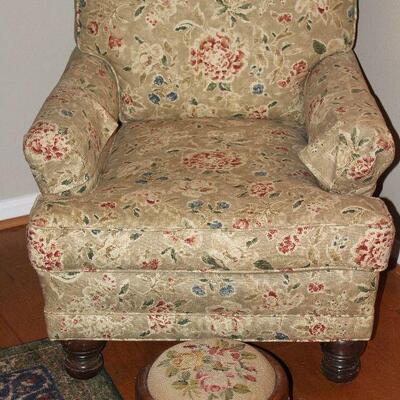 Taupe Floral Upholstered Vintage Easy Chair show with an Antique Mahogany Cabriole Foot NeedlePoint Foot Stool (12â€D x 6â€H)