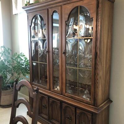 Beautiful solid vintage hutch with 2 upper glass doors and solid wood lower doors
