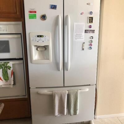 White Maytag fridge with lower freezer pullout
