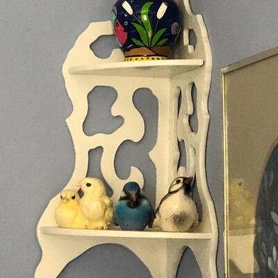 Free standing shelf, bird ornaments, and vase