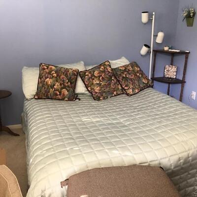 Full bed (mattress, pillows, bedding), side table, lamp, shelving unit