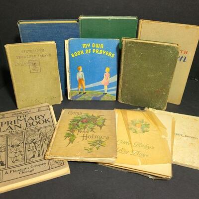 https://ctbids.com/#!/description/share/749435 Ten vintage and antique books. One is dated back to 1909. For age some are in good...