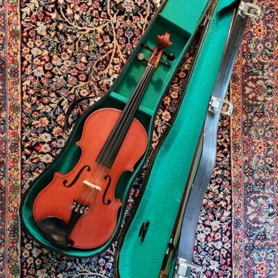 https://ctbids.com/#!/description/share/749375 Beautiful Aubert violin with storage case. Inside says Cremona and fecit anno domini...