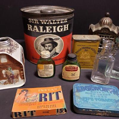 https://ctbids.com/#!/description/share/749390 Collection of vintage tins. Includes Sir Walter Raleigh and Philip Morris tobacco tins, a...