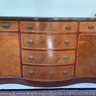 https://ctbids.com/#!/description/share/749468 Beautiful Duncan Phyfe styled buffet cabinet with curved lines with brass pulls. Two...