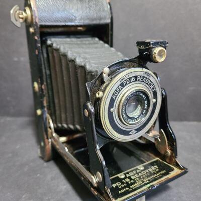 https://ctbids.com/#!/description/share/749453 Foldable AGFA PD 16 readyset camera. Has an accordion style body and still folds and...