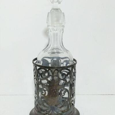 https://ctbids.com/#!/description/share/749426 Sterling wine bottle holder is 6