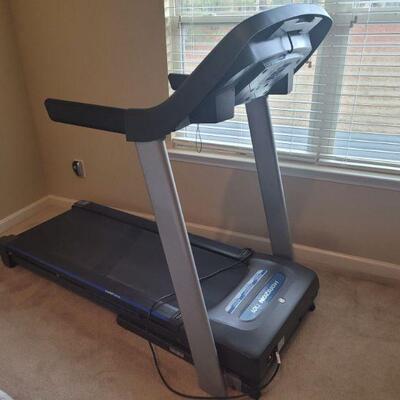 This is a folding treadmill. When folded it is 62