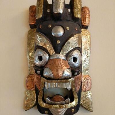 This is a beautiful Tibetan mask purchased at 10,000 Villages. It measures 15