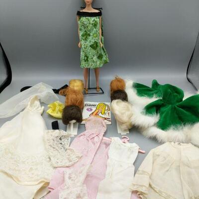 Any Barbie collector will love this Fashion Queen Barbie with six wigs, Skipper book, homemade dresses. Barbie has â€œMidge 1962 and...