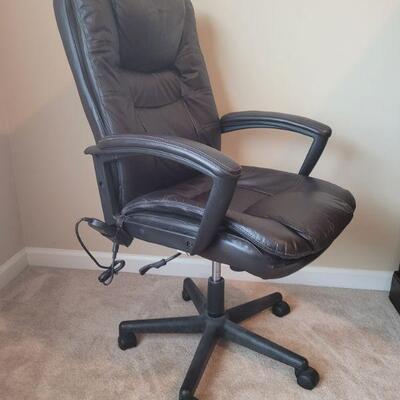 True Seating Concepts desk chair is height adjusting. The back is 43