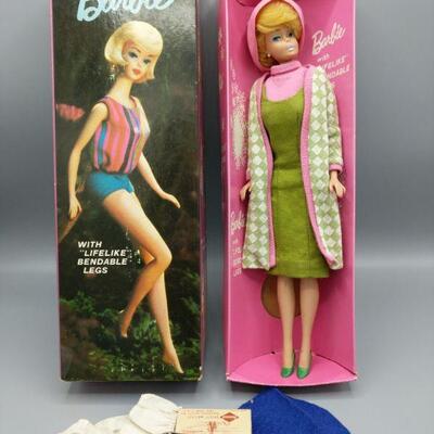 This is a find! Blonde bubblecut Barbie is stamped 1958 on her tush. She does not appear to be in her original box. Includes a green and...