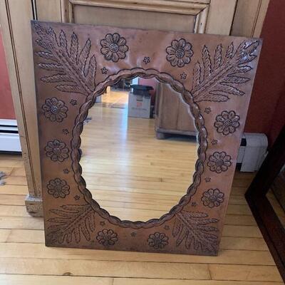 Hand punched metal framed mirror