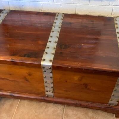 Solid wood trunk, great size-perfect for blankets or storage 