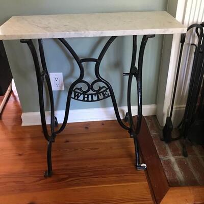White  sewing machine base with marble top $155