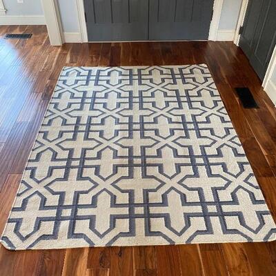 5 x 7 wool-cotton rug - $150 
(Retails for $268 on rugsandblinds.com)