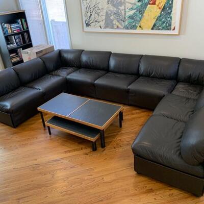 Lot #8--leather sectional, has great support, very comfortable, As Is--$395--back 139