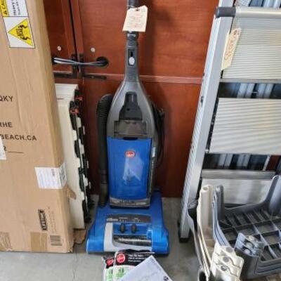 #2034 â€¢ Hoover Vaccum And 3 Replacement Bags