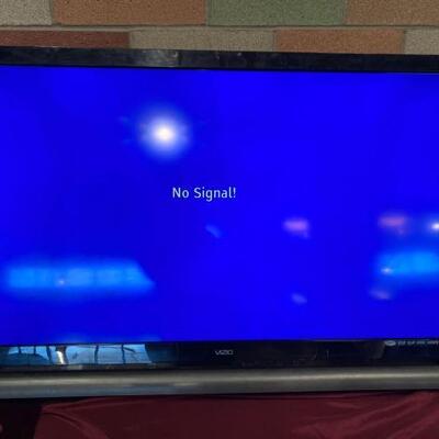 #1142 â€¢ 55" Vizio Television with stand