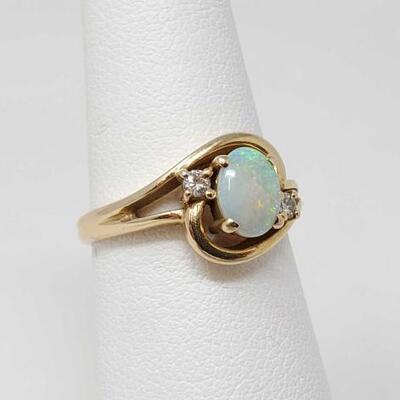 251	

14k Gold Ring With With Diamonds And Opal, 3.5g
Weighs Approx 3.5g. Size 6.5.