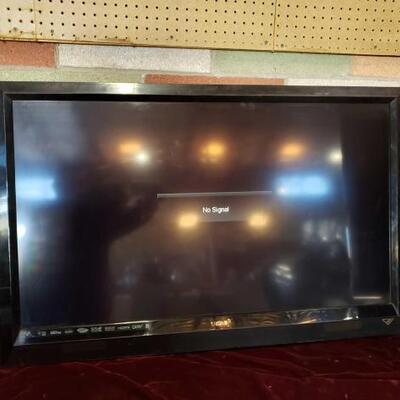 #1136 â€¢ 42" Vizio Television with Stand