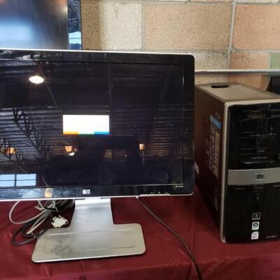 #1144 â€¢ 24" HP w2408 desktope monitor and HP Pavilion computer tower