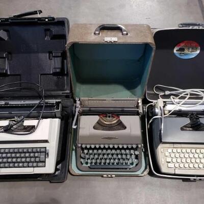 #4074 â€¢ Three Typewriters