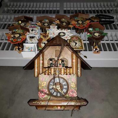 #4038 â€¢ Mini Cuckoo Clocks and One Cuckoo Clock 