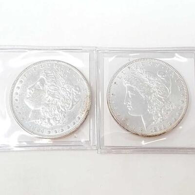 #646 • 1884 And 1885 Morgan Silver Dollars