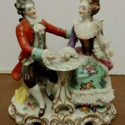 https://www.ebay.com/itm/115379236174	JK3007 VINTAGE 5 INCH GERMAN Volkstedt  Porcelain GENTLEMAN & LADY PLAYING CARDS FIGURINE		BIN...