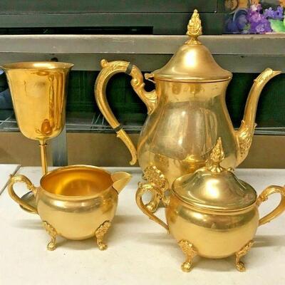 https://www.ebay.com/itm/125315766159	OL7017 Babylon 1978 Brass Teapot w/ Sugar and Creamer LOCAL PICKUP		BIN	 $69.99 
