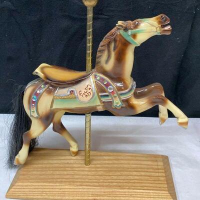 https://www.ebay.com/itm/115384641410	LB1008 COLLECTIBLE CAROUSEL HORSE BLONDE & BROWN W TAN SADDLE, UNMARKED FIGURE		BIN	 $99.99 
