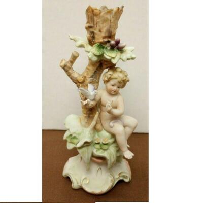 https://www.ebay.com/itm/115365132579	JK3019 VINTAGE 8 INCH GERMAN BOY IN TREE WITH BIRD FIGURINE dresden porcelain		BIN	 $224.99 
