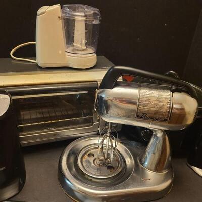 Two can openers a Black and Decker and an Oster. Dormeyer mixer does not come with bowl. Toaster oven measures 16" x 12" x...
