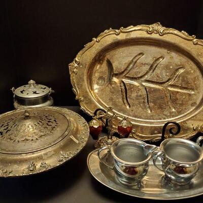 Silverplated assortment. Large platter 20", covered dish 12x4", strawberry salt and pepper set, creamer and sugar bowls, tray...