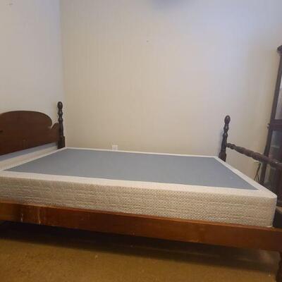 Wooden bed frame does come with box spring but no mattress. Measures 80