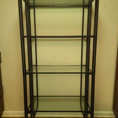 Metal frame with glass shelves in good condition. Measures 32" x 17" x 68".

https://ctbids.com/#!/description/share/768272 