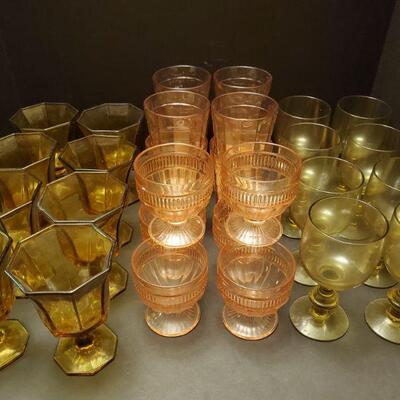 4 sets of colored glasses. Brown goblets 6