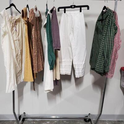 Children's collection of Civil War Reenactment clothing. Includes dresses, shirts and more. Dresses appear to be small, boys shirt...