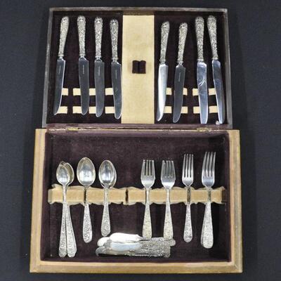 Sterling flatware and serving  pieces in Repousse pattern