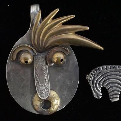 1015	DESIGNER MIXED METAL FACE PENDANT BASE MADE FROM A SILVER PLATE UTENSIL, STERLING SILVER ZEBRA PIN  WEIGHT .548 OZT AND ANTIQUE...