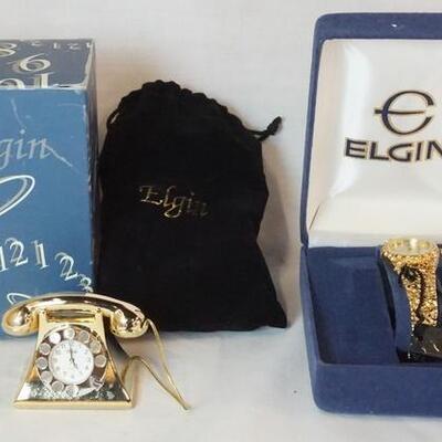 1012	ELGIN GOLD NUGGET STYLE WATCH NIB AND  TELEPHONE MINI DESK CLOCK WITH BOX AND POUCH.
