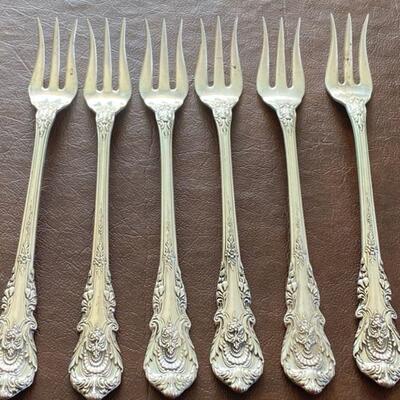 Six Wallace Sterling Relish Forks (Sir Christopher). Each fork measures about 5.8” 