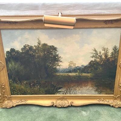Framed Oil on Canvas landscape scene; circa 1902; signed JH Boel and features a man on a boat on a body of water. 
J.H. Boel was an...
