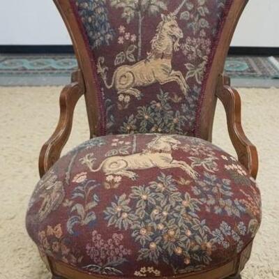 1021	CARVED WALNUT VICTORIAN SIDE CHAIR, RENAISSANCE REVIVAL, HAS UNICORN UPHOLSTERY, 22 1/2 IN WIDE X 36 1/2 IN HIGH
