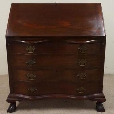 1015	CHARAK MAHOGANY SLANT FRONT DESK, HAS BALL & CLAW FEET FRONT & BACK, SERPENTINE FRONT, 36 IN WIDE X 42 1/2 IN HIGH
