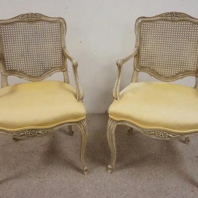 1072	PAIR OF KINDEL FLORAL CARVED CANE BACK ARM CHAIRS, PAINTED WHITE, 22 IN WIDE X 34 1/2 IN HIGH
